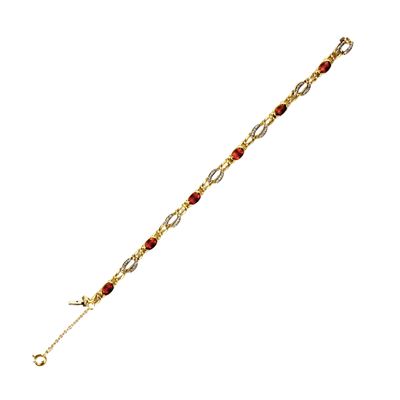 Bracciale a maglie in oro giallo 18 kt con elementi in pavé di diamanti e quarzi cabochon