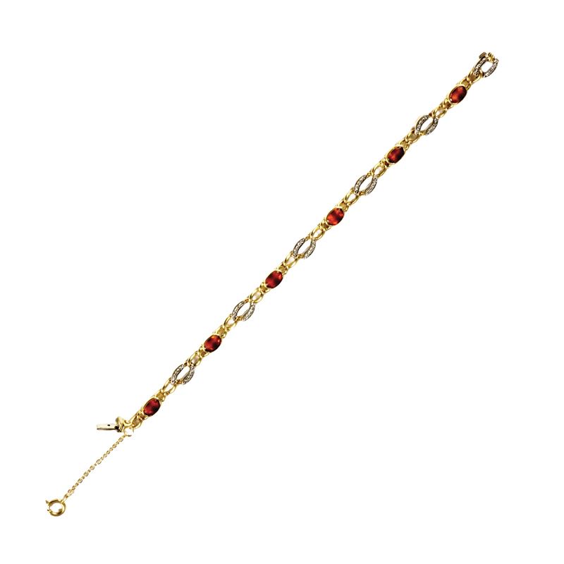 Bracciale a maglie in oro giallo 18 kt con elementi in pavé di diamanti e quarzi cabochon