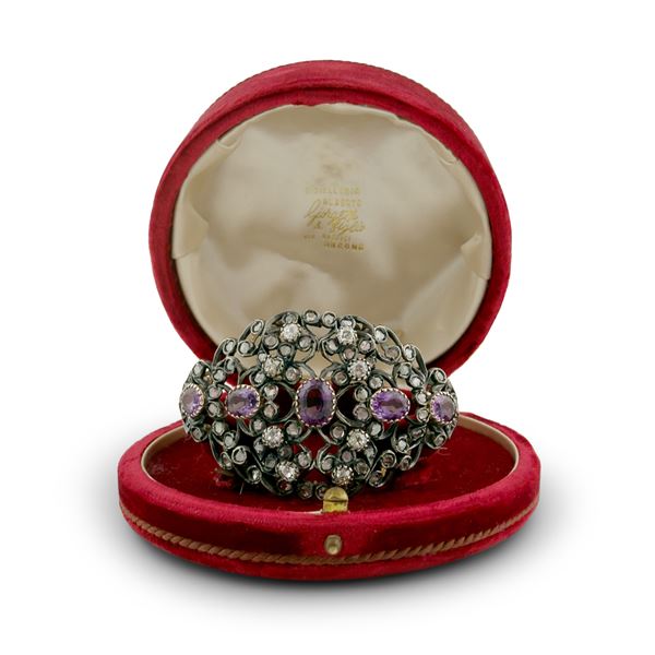 Bracciale in oro giallo 18kt. e argento decorato da cinque ametiste e diamanti