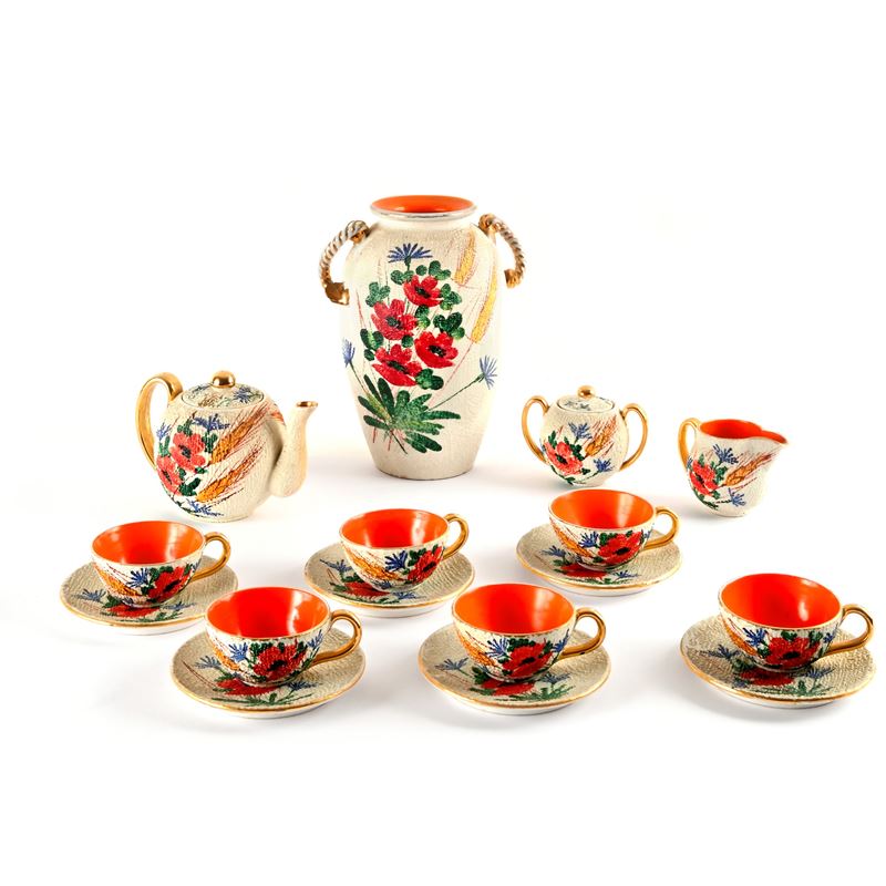 Servizio da tè in ceramica bianca e policroma