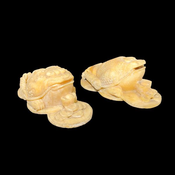 Coppia di sculture in marmo bianco