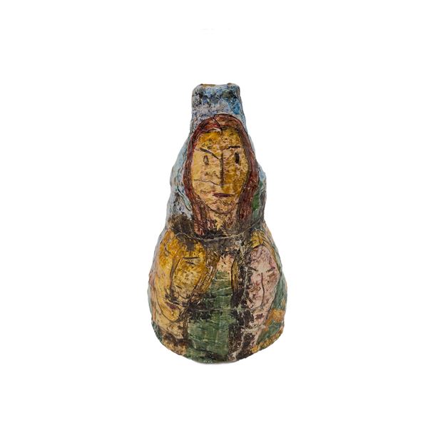 Lume in ceramica policroma, La Tana