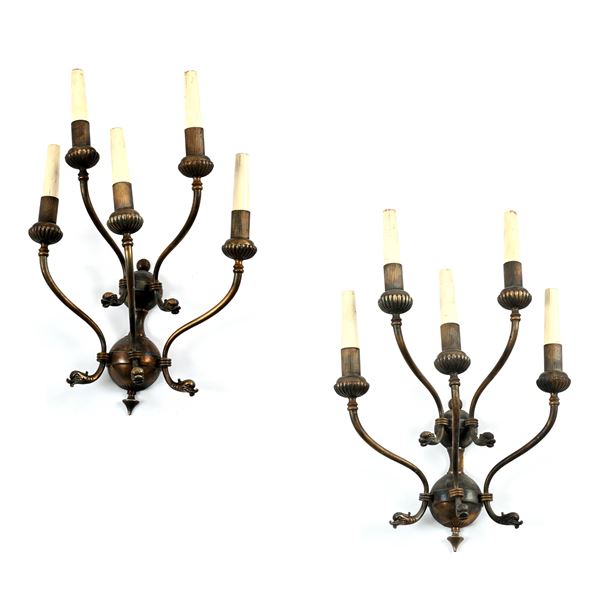 Coppia di appliques in bronzo e metallo patinato