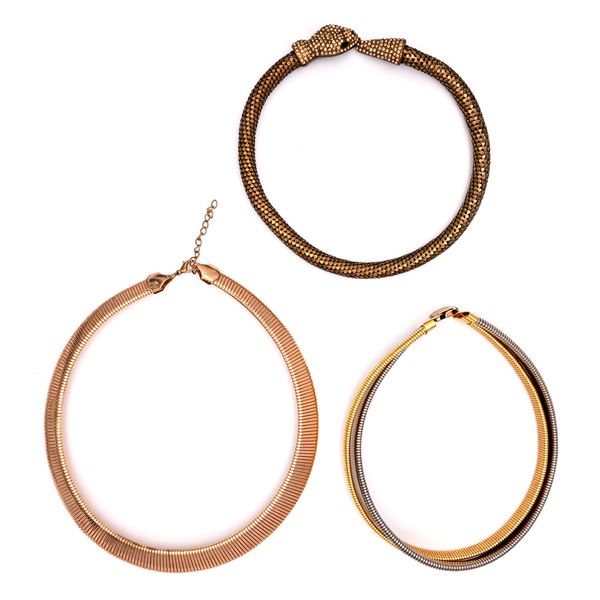 Tre collane in metallo dorato e argentato