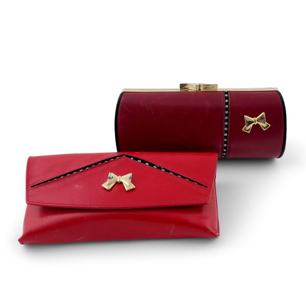 Due custodie per occhiali in pelle rossa e strass, Nina Ricci