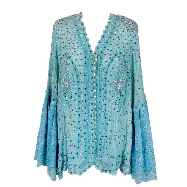 Blusa in tessuto a fondo turchese