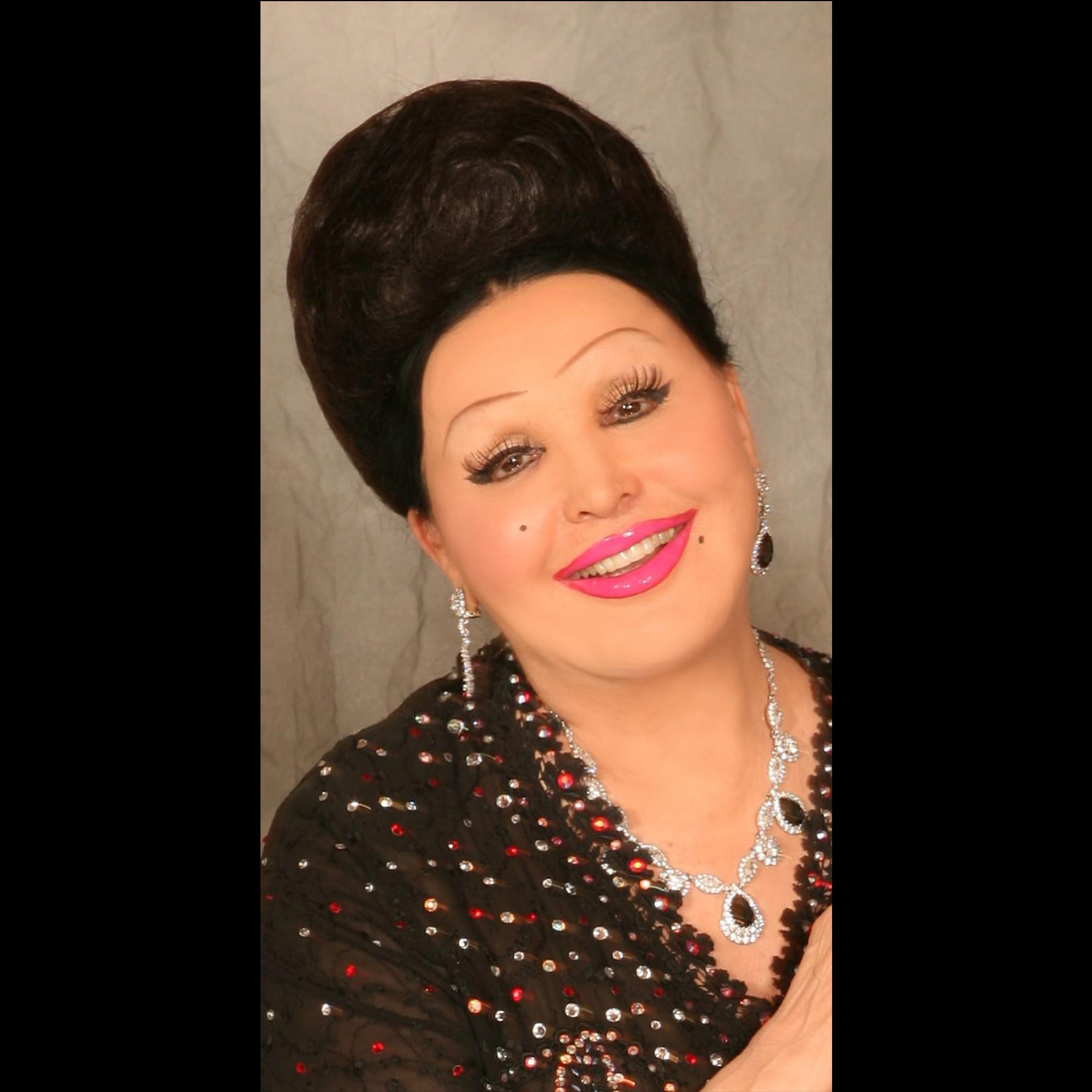 Blusa in tessuto a fondo marrone