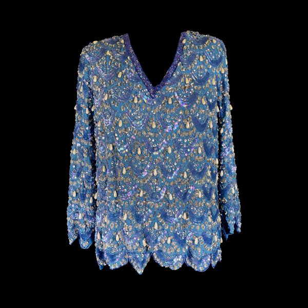 Blusa in seta a fondo azzurro