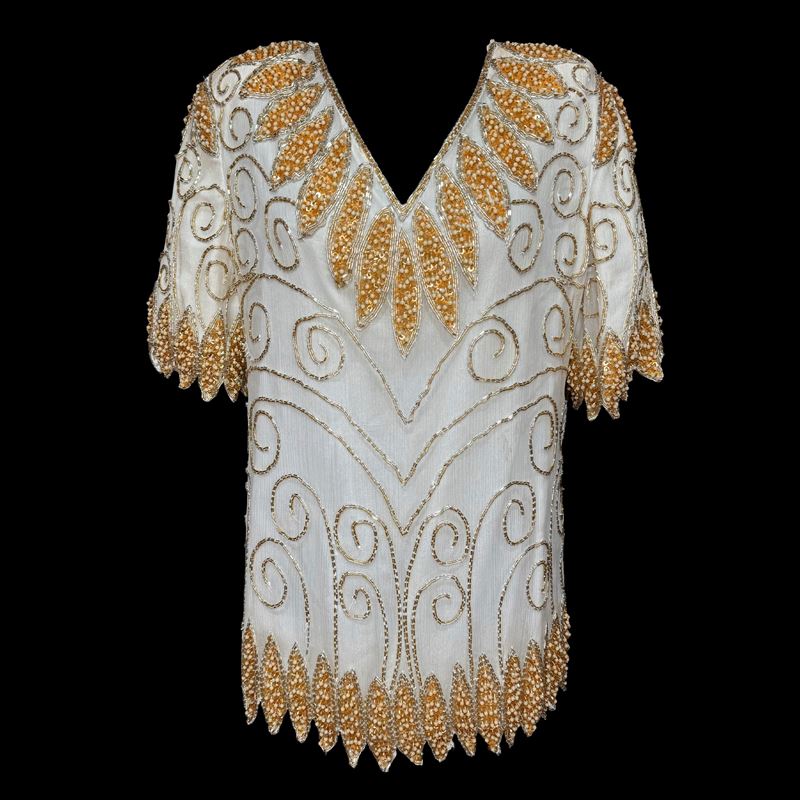 Blusa in Seta Indiana a Fondo Bianco Arricchita da Paillettes e Cannette Argentate