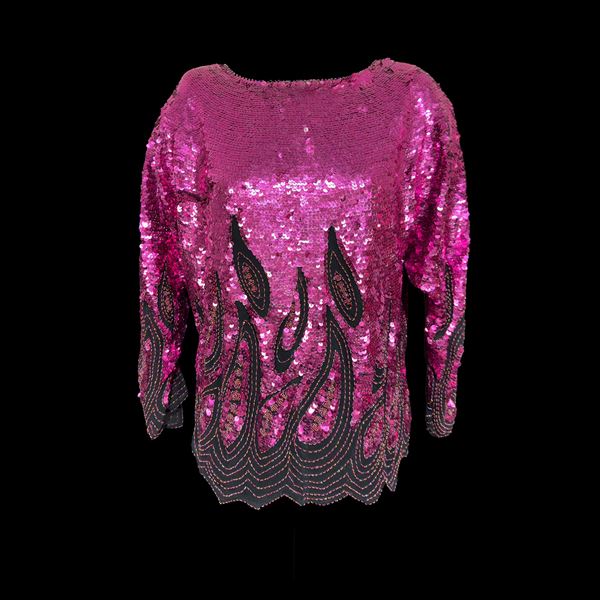 Blusa in tessuto nero interamente rivestita di paillettes fucsia