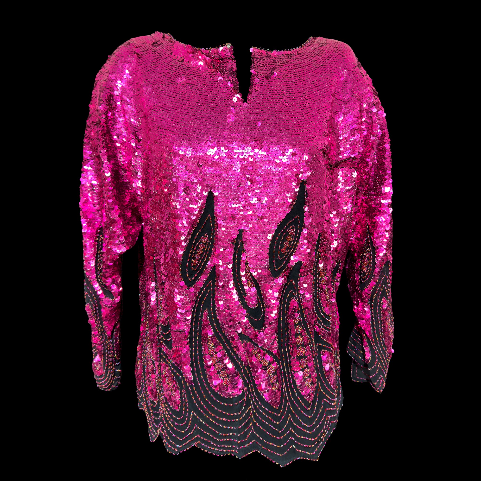 Blusa in tessuto nero interamente rivestita di paillettes fucsia