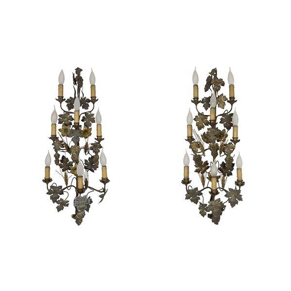 Coppia di appliques in metallo dorato