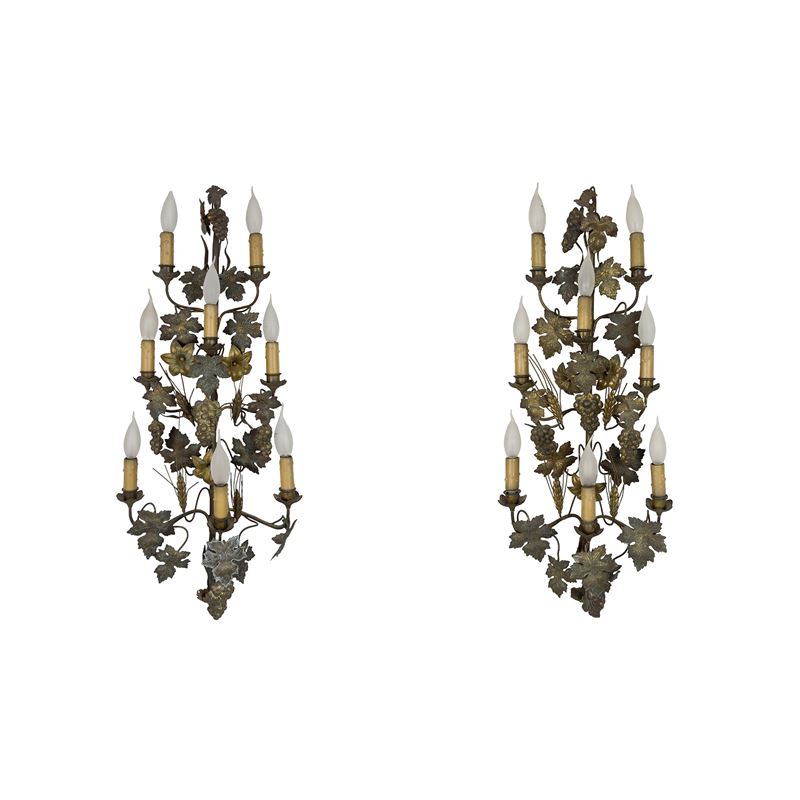 Coppia di appliques in metallo dorato