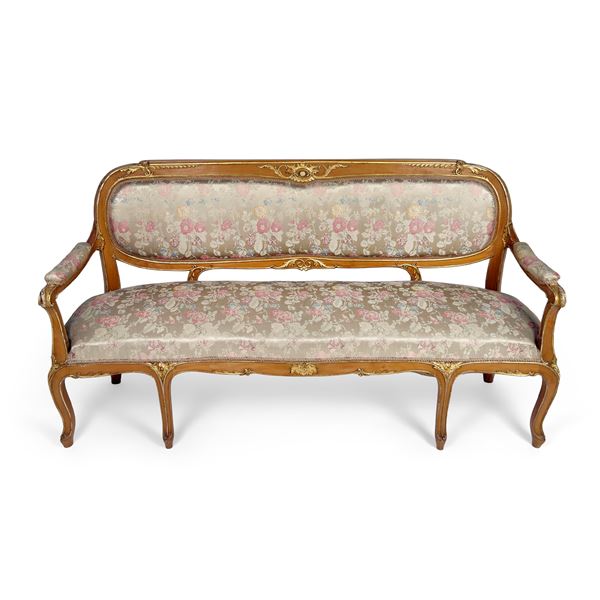 Divano in legno parzialmente dorato