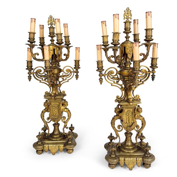 Coppia di candelabri in bronzo dorato