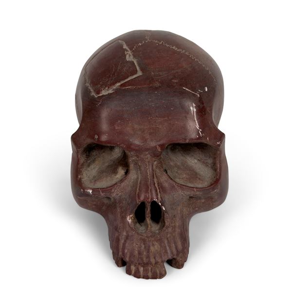 Teschio in marmo rosso antico