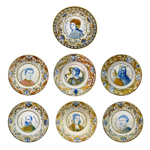 Sei piatti e una ciotola in maiolica bianca e policroma in parte a lustro, Italia Centrale