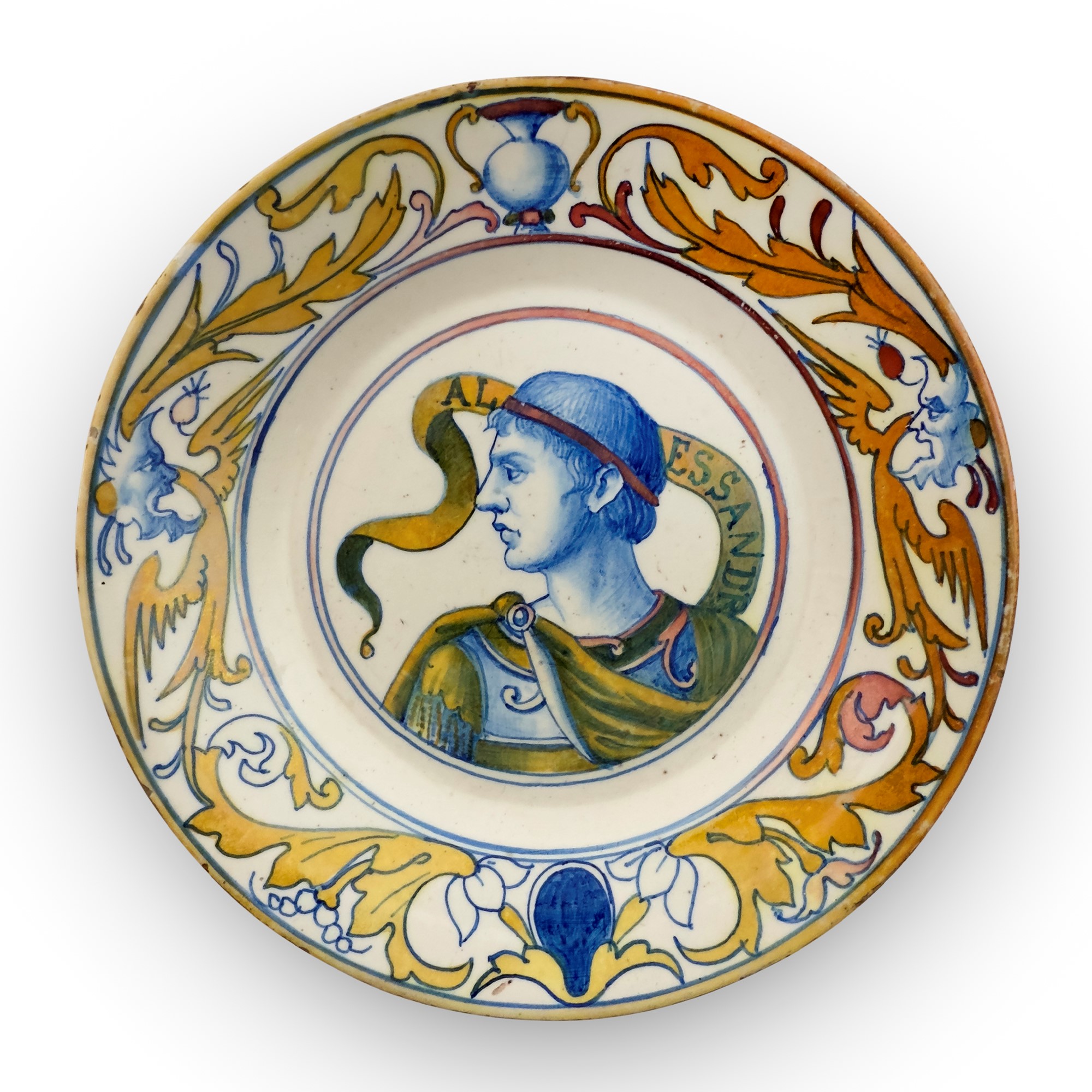 Sei piatti e una ciotola in maiolica bianca e policroma in parte a lustro, Italia Centrale