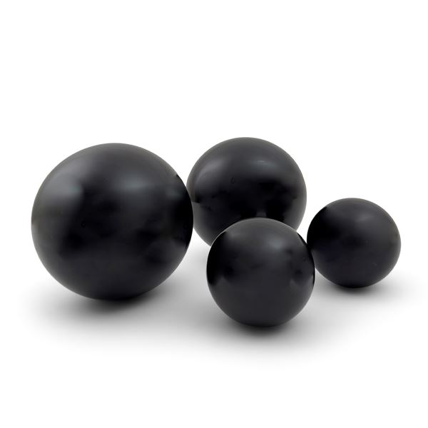 Collezione di quattro sfere in marmo nero del Belgio