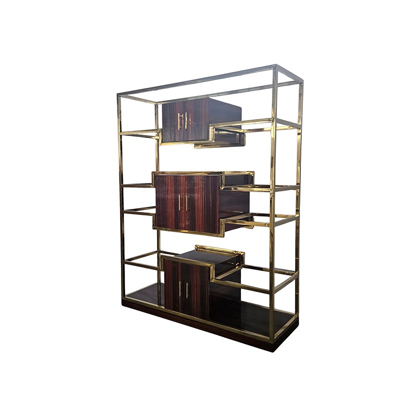 Libreria di forma geometrica in ottone dorato