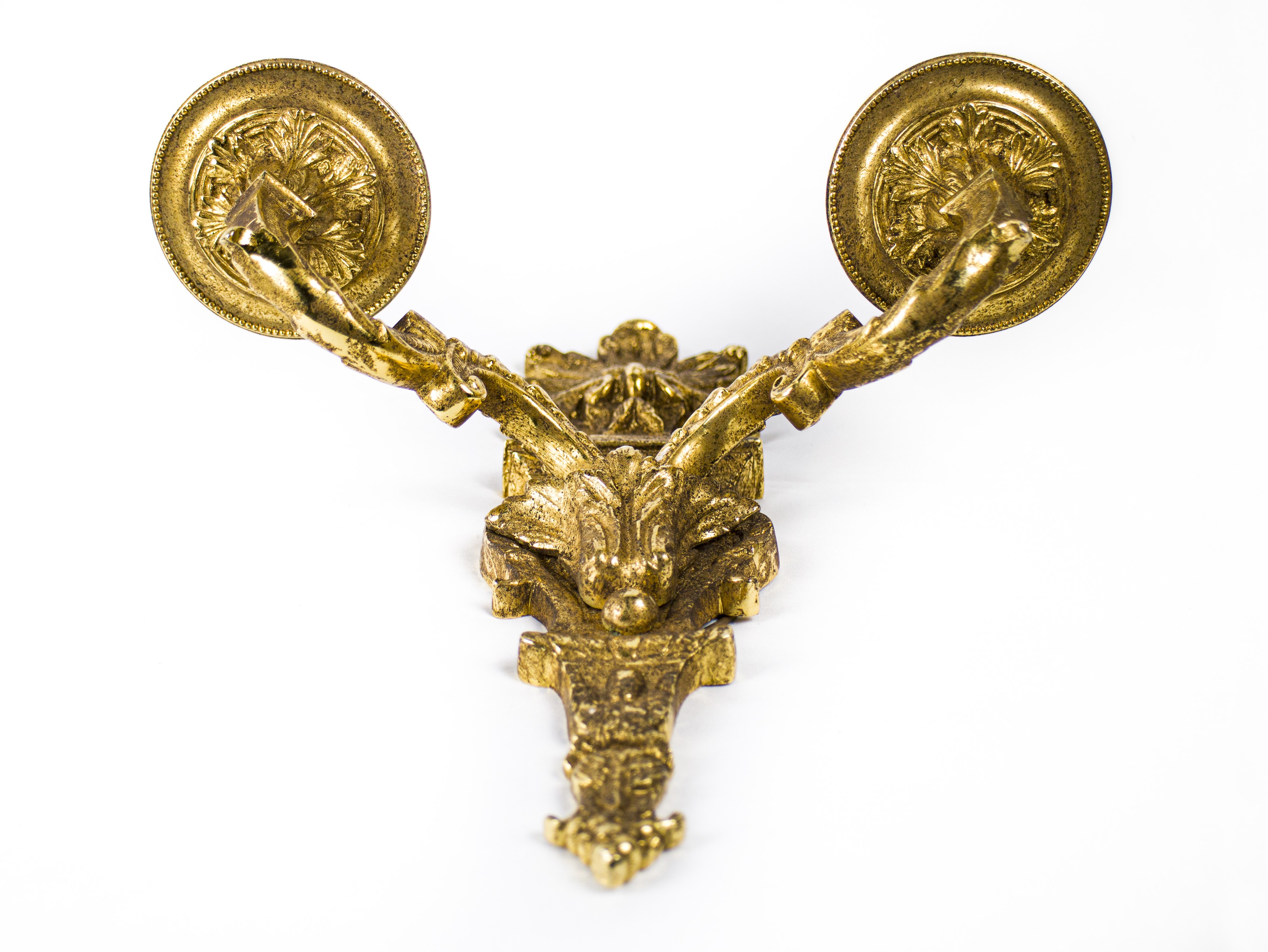 Appliques in bronzo cesellato e dorato, sei unità