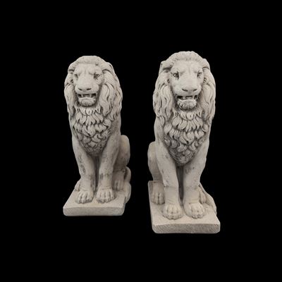 Coppia di leoni accosciati, scultura in pietra
