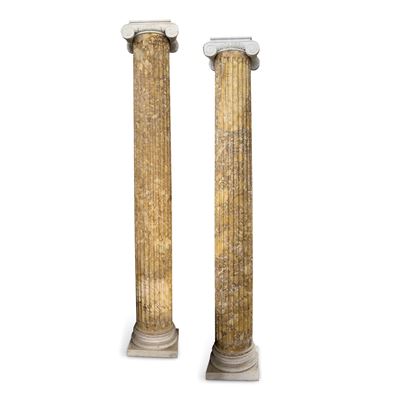 Coppia di colonne scanalate in breccia di Siena con capitelli ionici e plinti, h. cm. 290