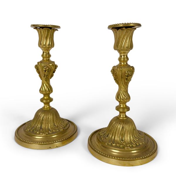 Coppia di candelieri in bronzo dorato, XIX secolo