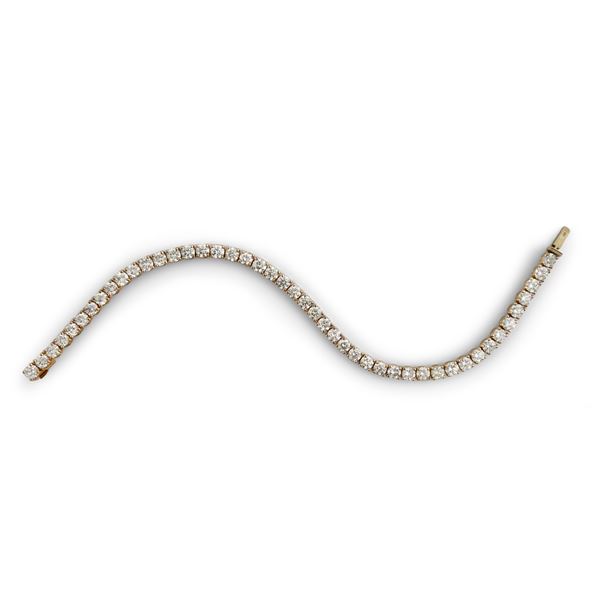 Bracciale tennis in oro giallo 18kt.