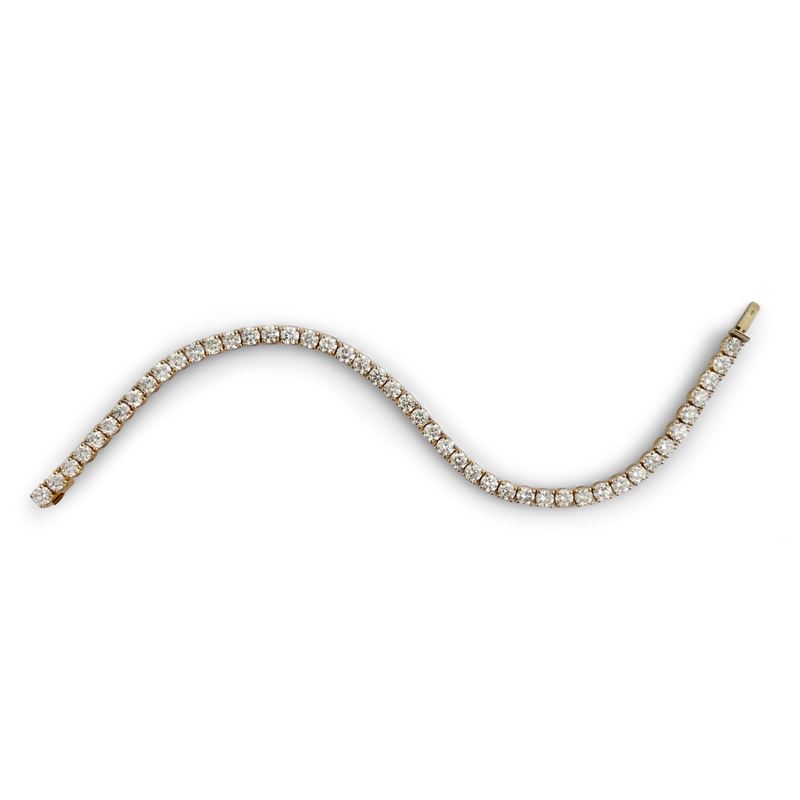 Bracciale tennis in oro giallo 18kt.