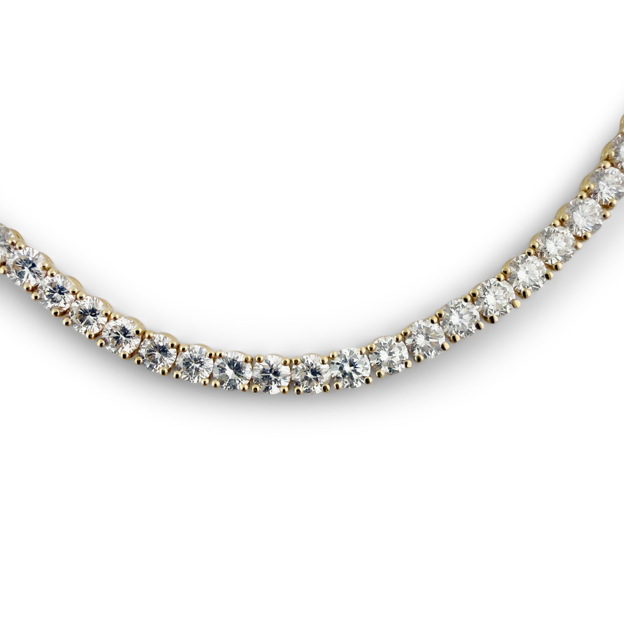 Bracciale tennis in oro giallo 18kt.