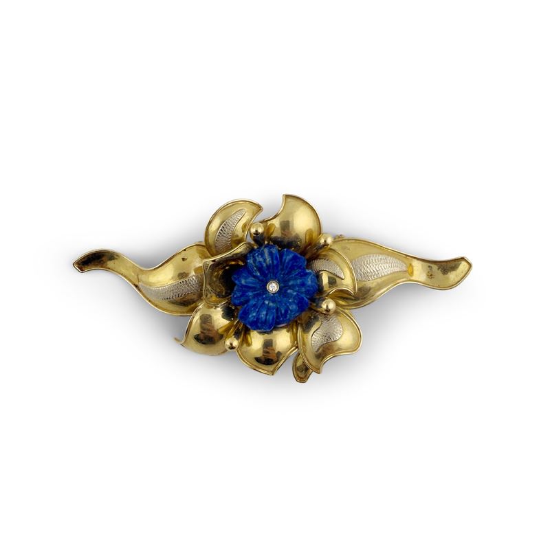 Spilla in oro giallo 18kt. cesellata a fiore