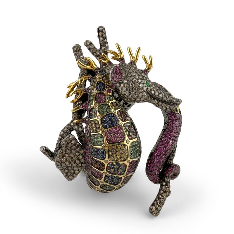 Bracciale rigido in argento brunito e dorato