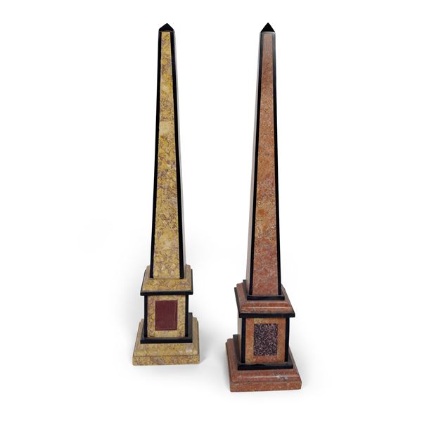 Due obelischi placcati in marmi policromi