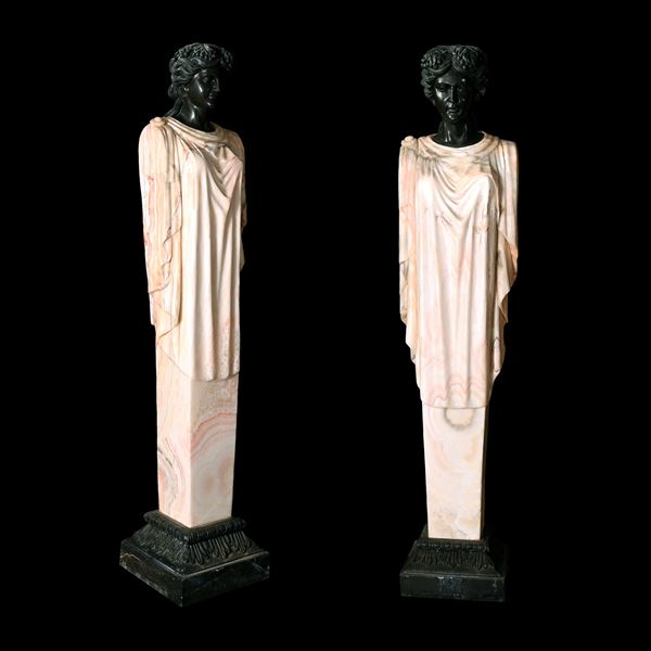 Coppia di erme in onice e marmo nero del Belgio