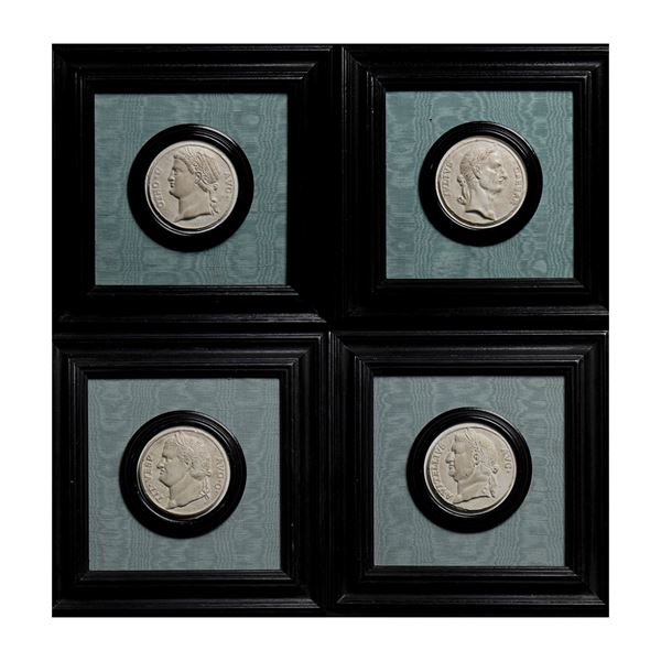 Quattro calchi in gesso di forma circolare, XIX secolo