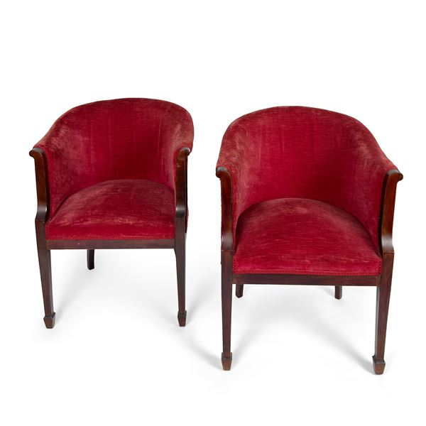 Coppia di poltroncine a pozzetto impiallacciate in mogano