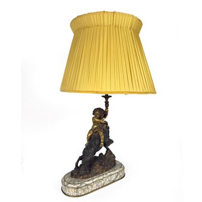 Lampada da tavolo in bronzo e metallo dorato, base con putto su caprone