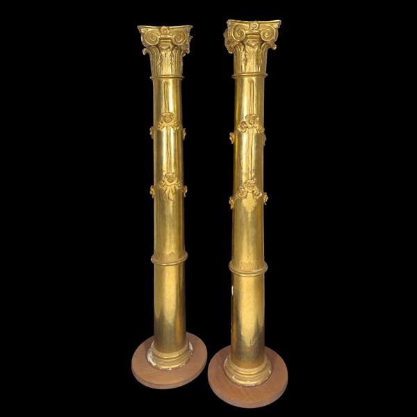 Coppia di colonne da parete in legno dorato, inizi del XIX secolo