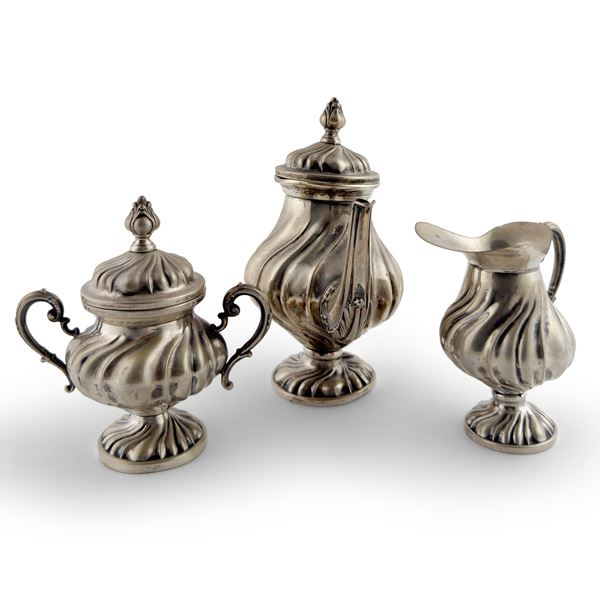 Servizietto solitaire da caffè in argento sbalzato