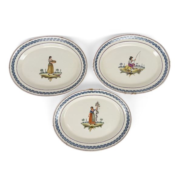 Tre vassoi ovali in terraglia bianca e policroma, Napoli, Migliuolo Giustiniani, XIX secolo