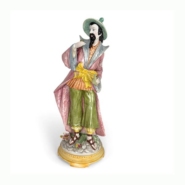 Figura di orientale in ceramica policroma