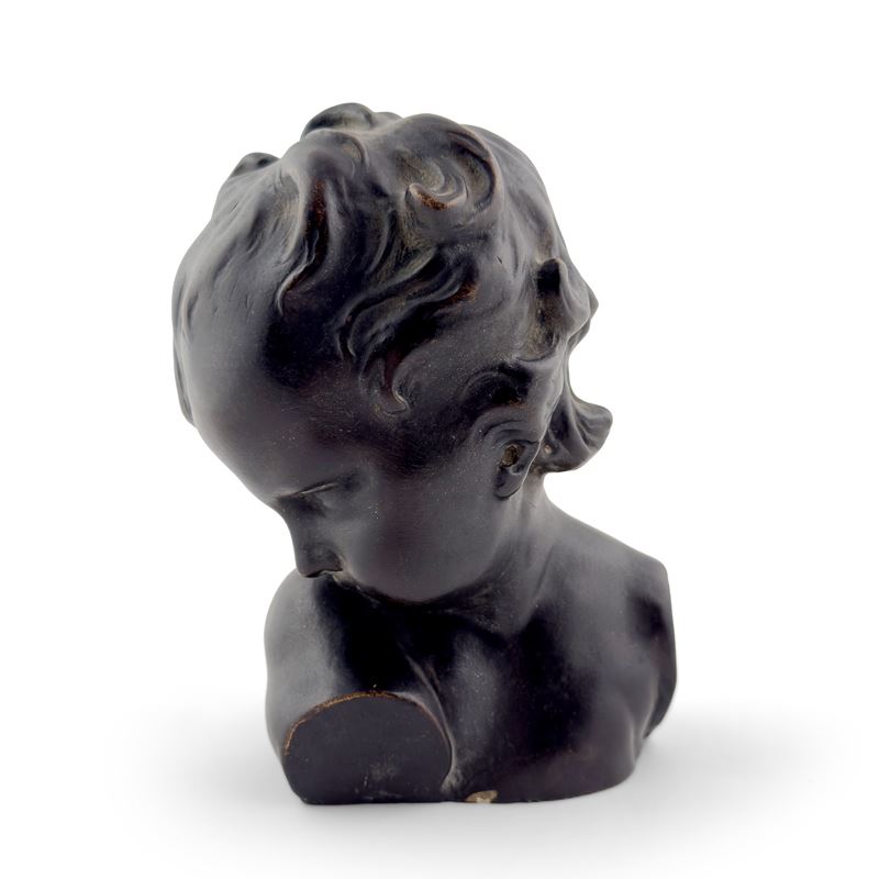 Bustino di putto in terracotta patinata a bronzo
