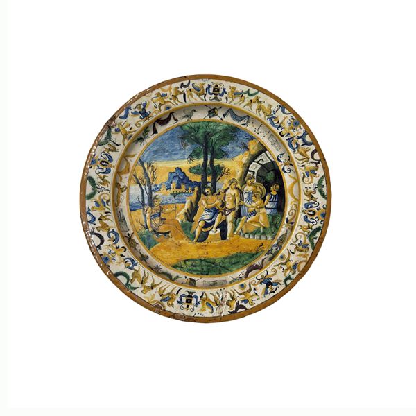 Piatto istoriato in maiolica bianca e policroma