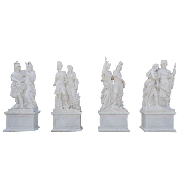 Quattro grandi gruppi in marmo bianco