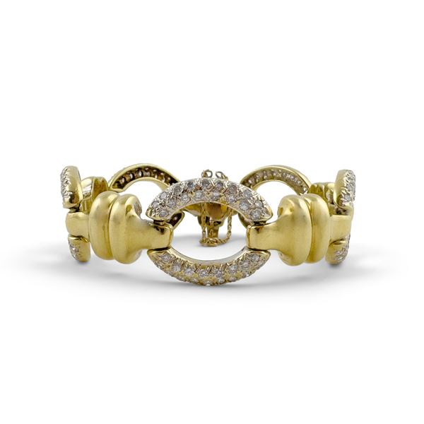 Bracciale in oro giallo 18kt. a maglie ovali con brillanti per circa 5 ct.