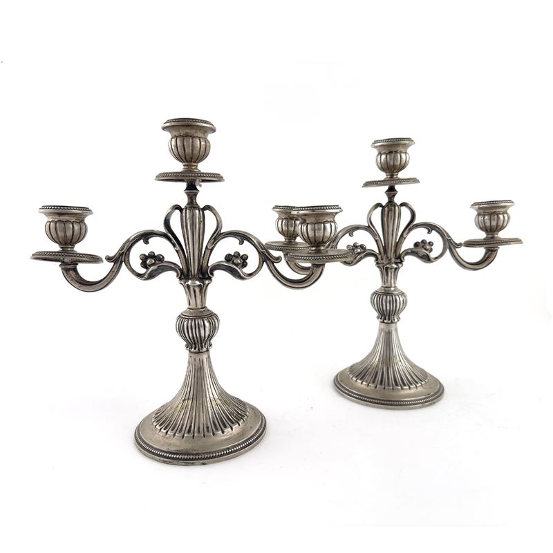 Coppia di candelabri, argento a tre luci