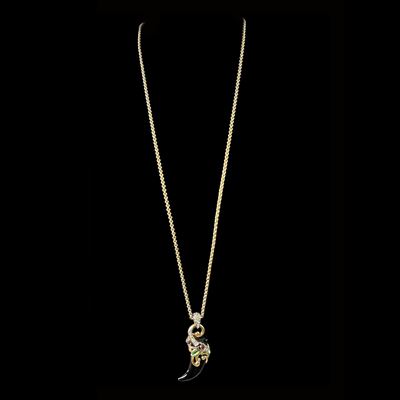 Roberto Cavalli, Collana in metallo dorato con pendente a corno in resina nera con smalti e stras...