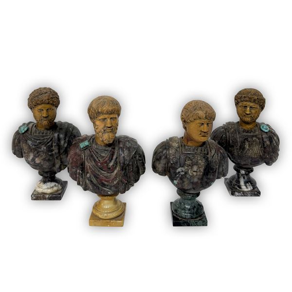 Quattro antichi piccoli busti di imperatore romano in marmo giallo antico e africano