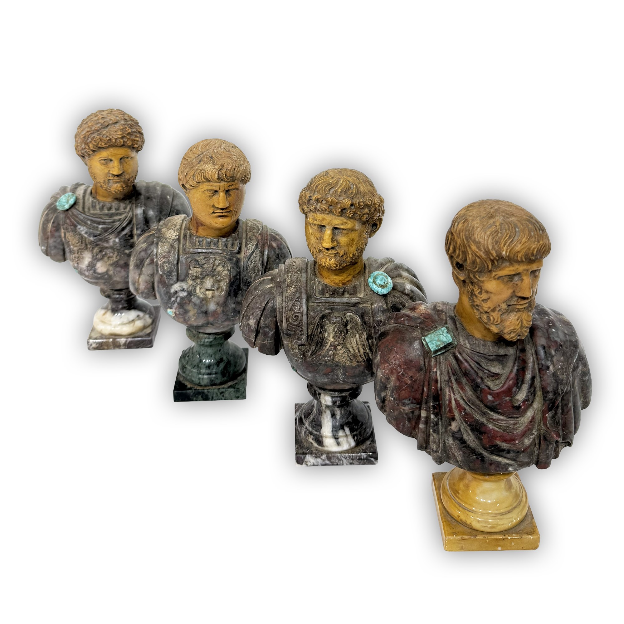 Quattro piccoli busti di imperatore romano, marmo giallo antico e marmo africano
